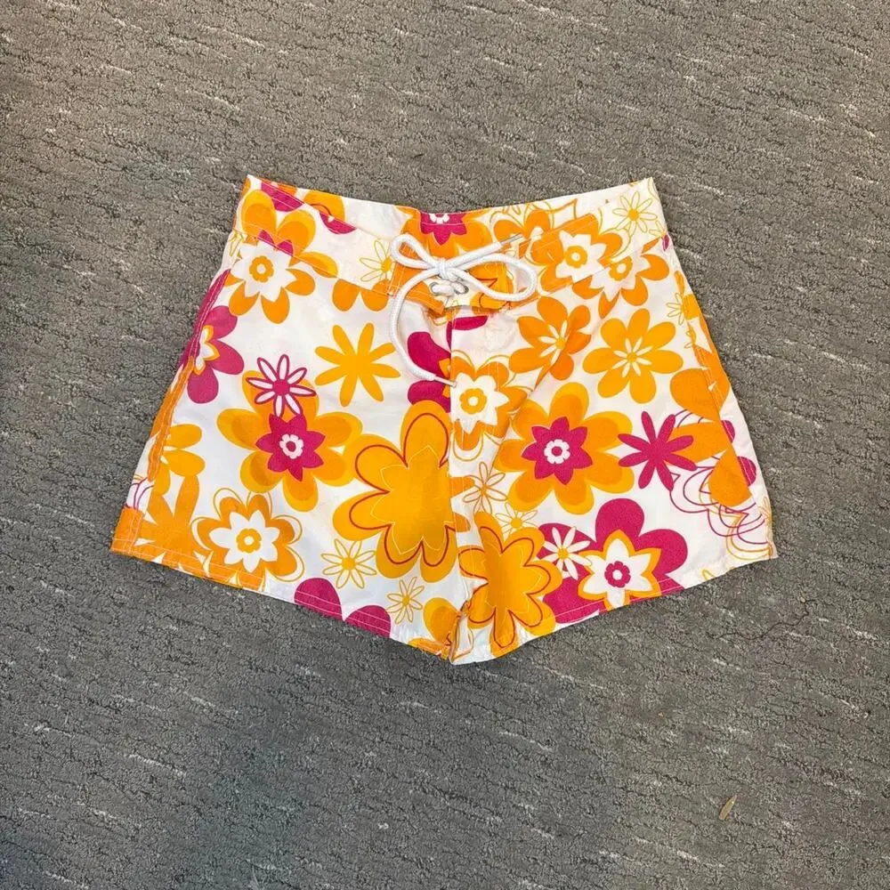 Cute vintage y2k white & orange swim shorts with floral hibiscus pattern